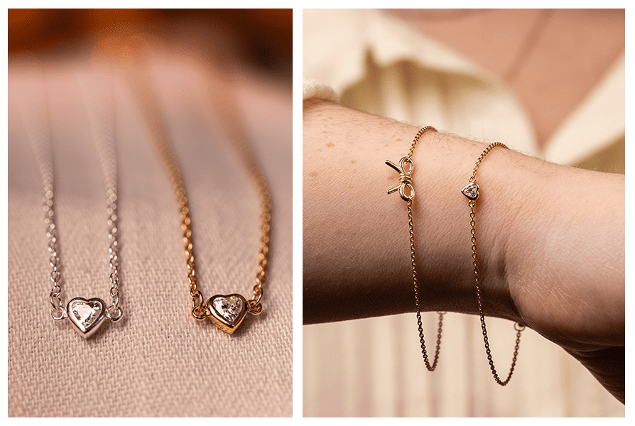 Dwie bransoletki z serduszkiem z cyrkonią (srebrna i złota) na jasnej tkaninie; obok nadgarstek z bransoletką serduszko i drugą delikatną bransoletką