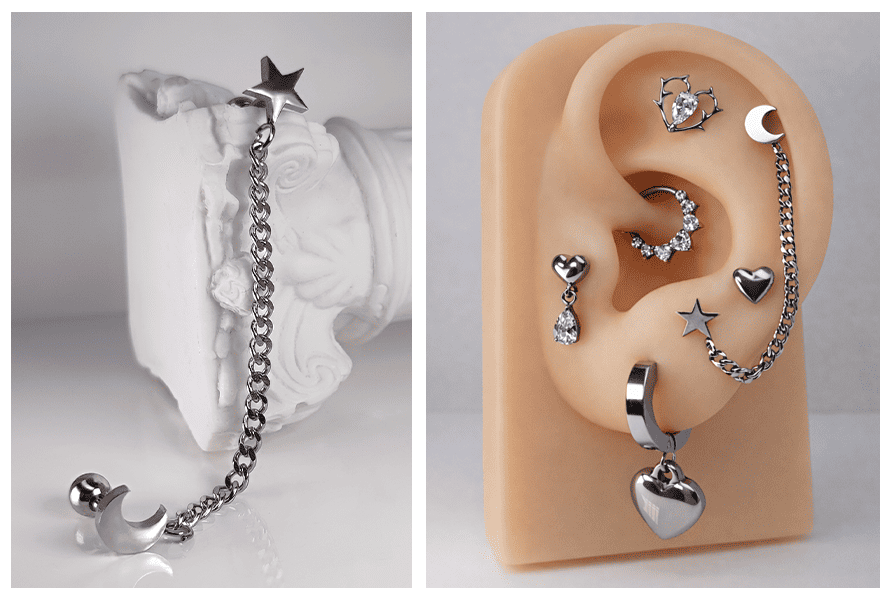 Srebrny kolczyk do dwóch przekłuć z łańcuszkiem, gwiazdką i księżycem, pokazany jako pojedynczy produkt na jasnym tle oraz w stylizacji na silikonowym uchu z inną biżuterią