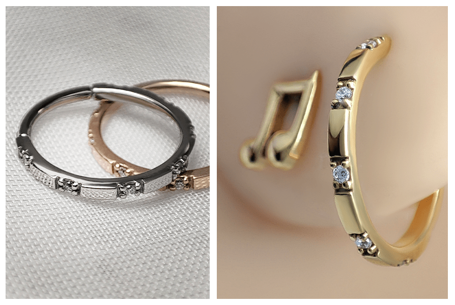 Srebrne i różowozłote kółko clicker prostokątne z segmentami i kryształkami na tkaninie oraz złoty wariant kolczyka w płatku ucha