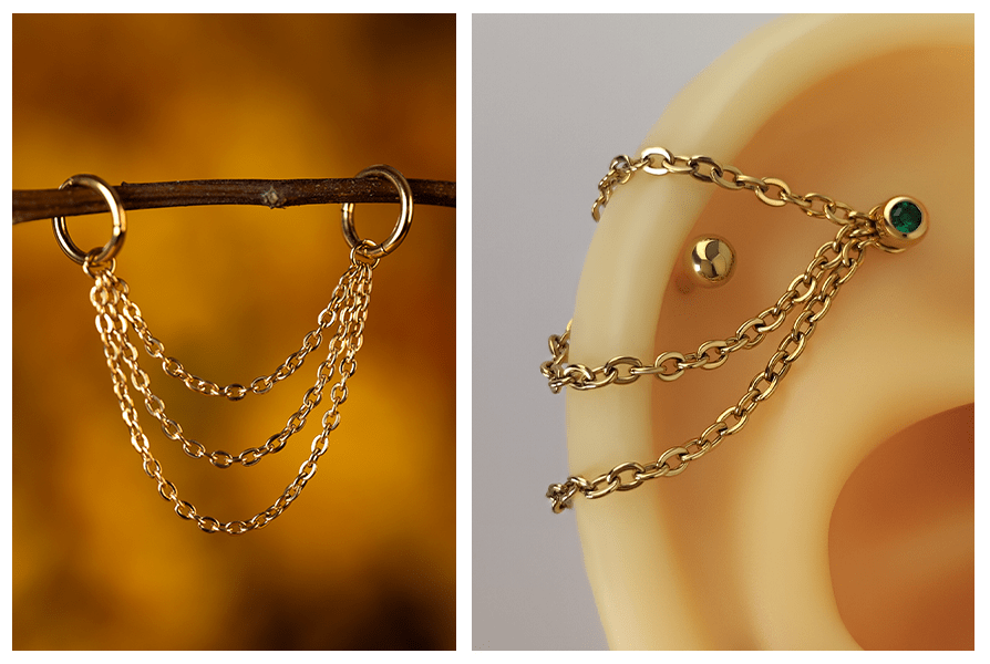 Złoty potrójny łańcuszek łączący dwa kolczyki kółka – widać go na gałązce oraz na modelu ucha z końcówką z zielonym kryształkiem
