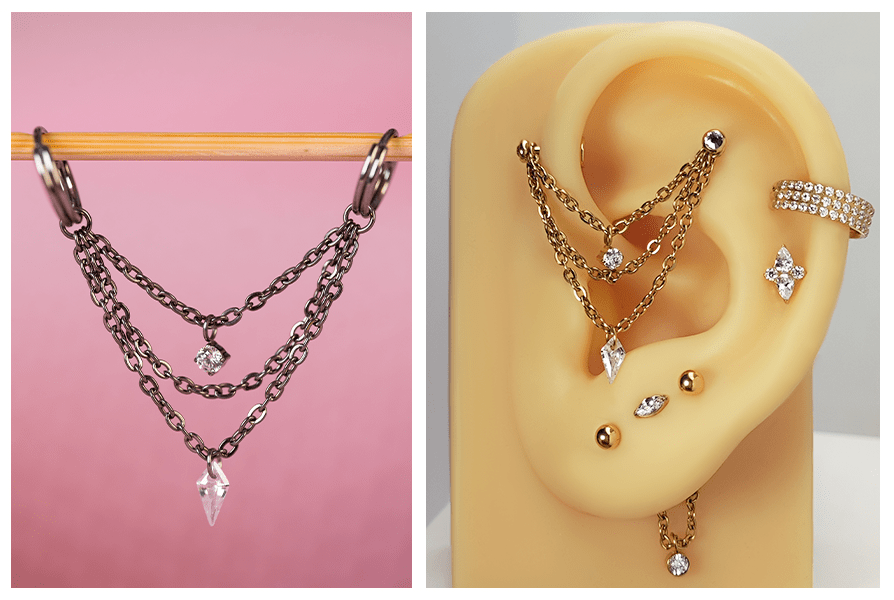 Potrójny łańcuszek z kryształkami jako dodatek do kolczyków – srebrna wersja łańcuszka na różowym tle i złota wersja założona na modelu ucha z kilkoma ozdobnymi przekłuciami