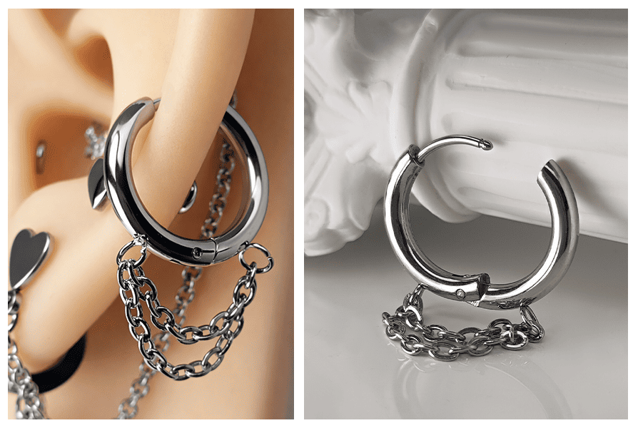 Clicker z dwoma łańcuszkami w srebrnym kolorze, zaprezentowany w zbliżeniu na uchu oraz jako otwarty kolczyk z widocznym zapięciem na jasnym tle