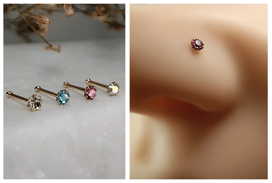 Zestaw prostych kolczyków do nosa z kryształem w koronie w złotym kolorze na marmurowym tle oraz zbliżenie różowego kryształu w koronie założonego w skrzydełku silikonowego nosa