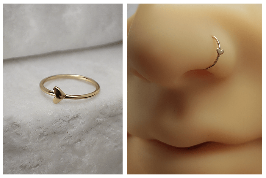 Cienkie kółko do nosa z drobnym serduszkiem na kamiennym tle i założone w skrzydełku nosa