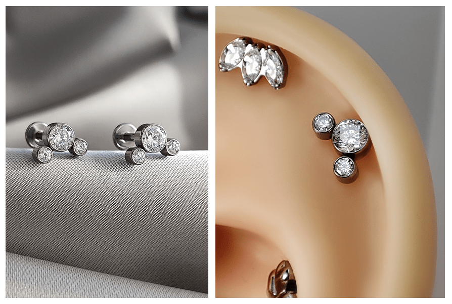 Labret z clustrem trzech kryształów — para kolczyków na tkaninie i wersja założona w uchu (helix)