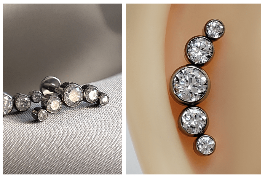 Srebrny labret z dużym klastrem – rosnące kryształy w oprawie bezel; detal produktu i wersja założona wzdłuż krawędzi ucha