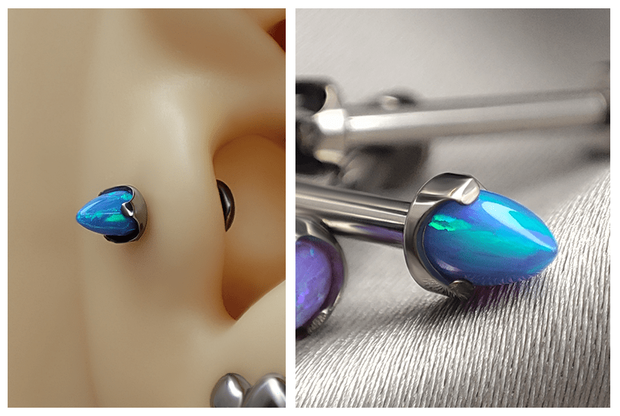 Niebieski labret z opalowym stożkiem bullet założony w uchu – detal oprawy i połysk syntetycznego kamienia