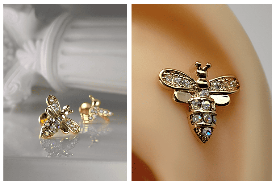 Złoty kolczyk w kształcie pszczółki z kryształkami, pokazany na jasnym tle z drugim modelem w tle oraz w dużym zbliżeniu po założeniu na uchu