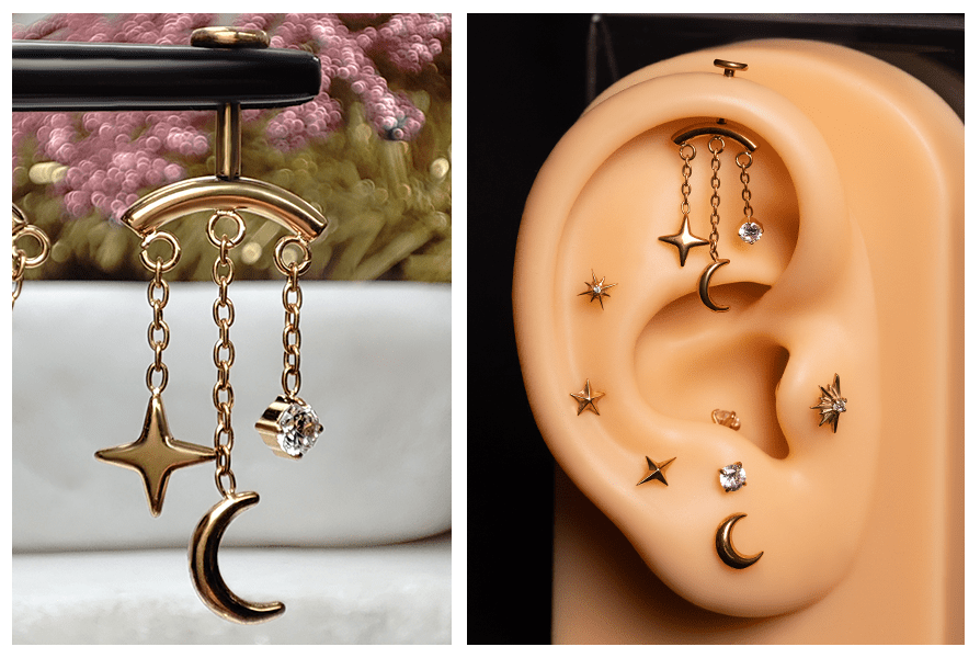 Złoty kolczyk z trzema wiszącymi zawieszkami na łańcuszkach (gwiazdka, księżyc i mały kryształek) – ujęcie na stojaku oraz założony w górnej części ucha jako labret do vertical helix