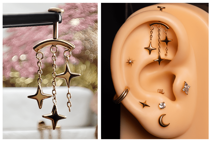 Złoty kolczyk z trzema wiszącymi gwiazdkami na łańcuszkach – pokazany na stojaku oraz założony w górnej części ucha jako labret do vertical helix