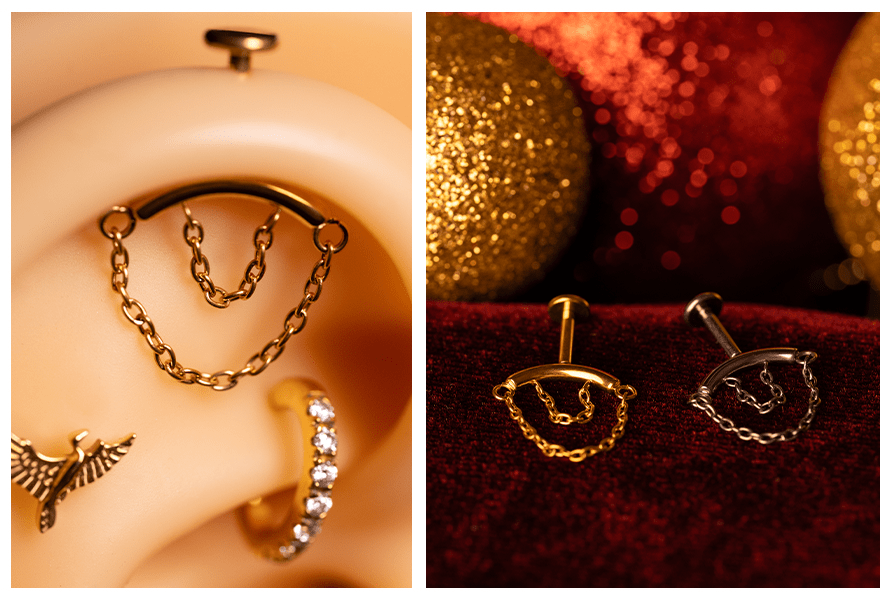 Zbliżenie w uchu: labret do vertical helix z dwoma łańcuszkami – obok wersja złota i srebrna sfotografowana na czerwonym welurze