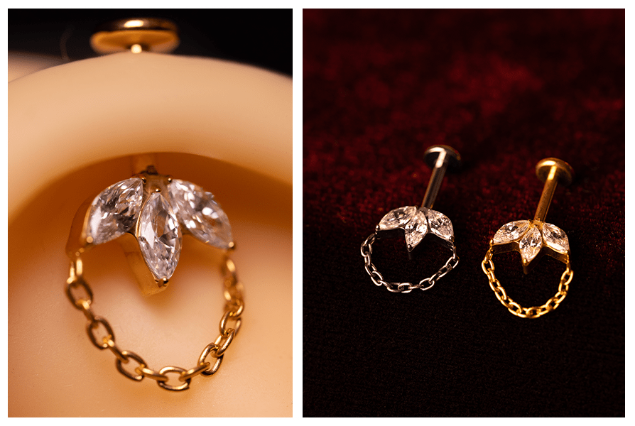 Zbliżenie ozdoby z trzema markizami ułożonymi jak listek i okrągłym łańcuszkiem przy labrecie – obok porównanie wersji srebrnej i złotej na czerwonym, welurowym tle