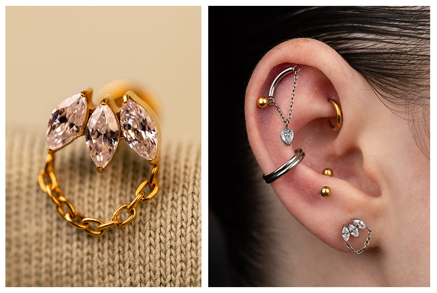 Labret z łańcuszkiem i trzema cyrkoniami w kształcie markizy w złotym kolorze, pokazany na jasnym tle oraz w stylizacji na uchu