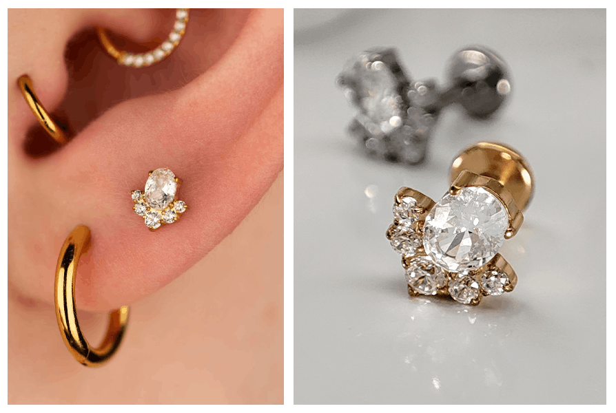 Złoty labret z owalną cyrkonią zdobiący płatek ucha w otoczeniu kółek i kolczyka sztangi