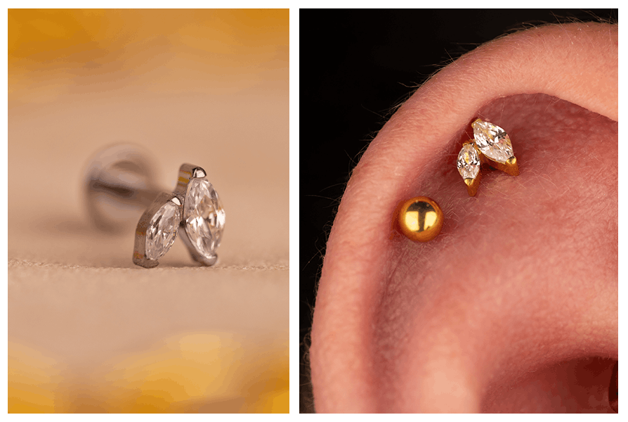 Bliskie ujęcie srebrnego labretu z dwiema cyrkoniami oraz ucho ze złotym kolczykiem w Helixie