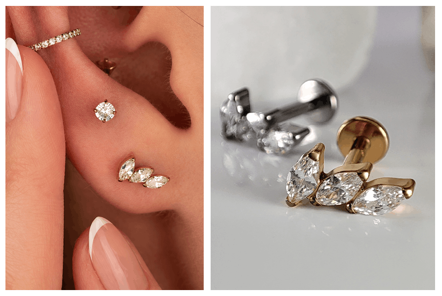 Trzy lśniące markizy w złotym labrecie zdobiące płatek ucha w kaskadowym ułożeniu cyrkonii