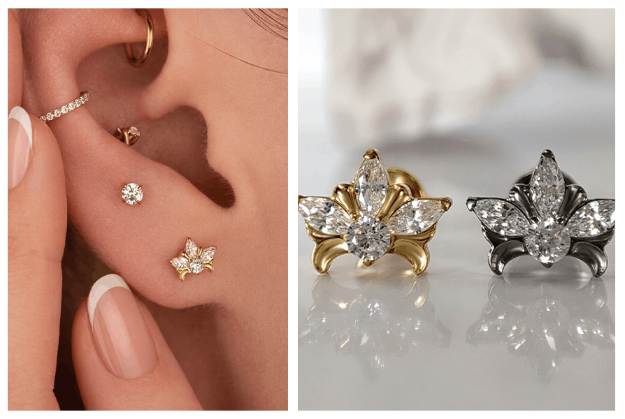 Złoty labret w kształcie kwiatu lotosu z cyrkoniami umieszczony w dolnej części ucha obok minimalistycznych kółek