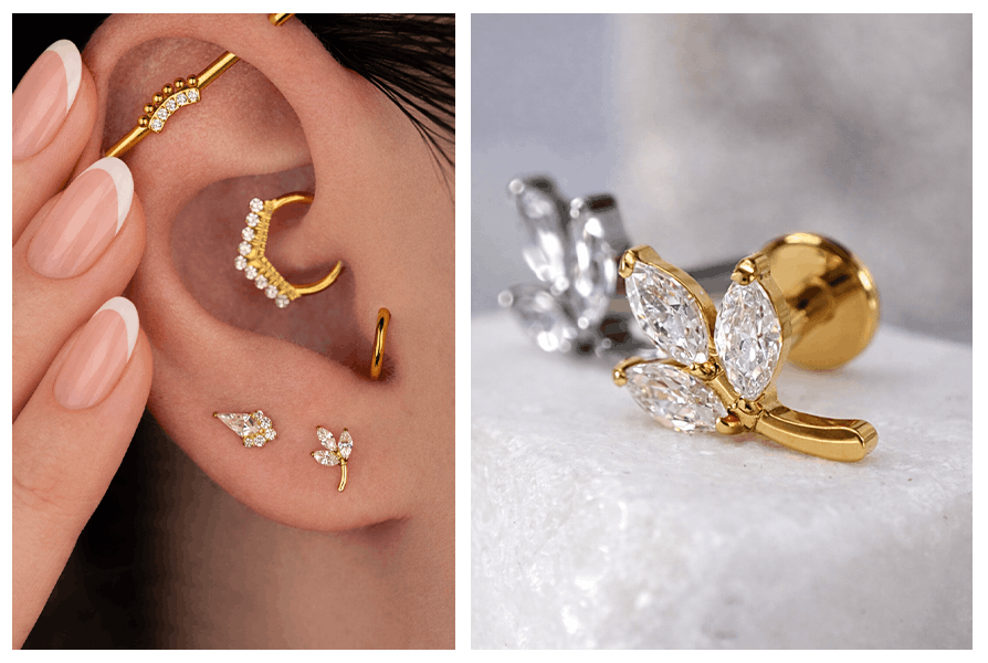 Delikatny złoty labret z listkami i cyrkoniami zdobiący płatek ucha w otoczeniu kółek typu clicker